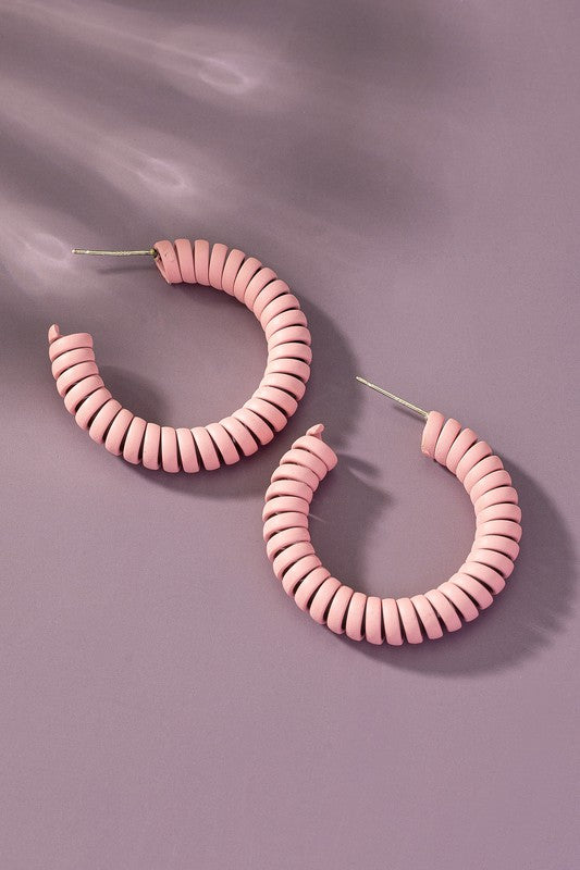 Spiral metal hoop earrings with color coating